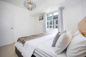 Легло или легла в стая в Furnished 2-Bedroom in Avida Towers Riala, Cebu IT Park with Fast WiFi, Netflix, Pool and More