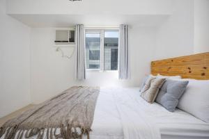 Легло или легла в стая в Furnished 2-Bedroom in Avida Towers Riala, Cebu IT Park with Fast WiFi, Netflix, Pool and More