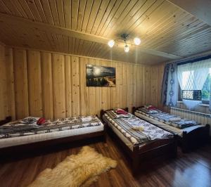 Postel nebo postele na pokoji v ubytování Chata na Grapie