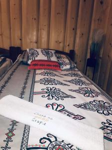 Postel nebo postele na pokoji v ubytování Chata na Grapie