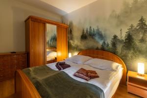 Posteľ alebo postele v izbe v ubytovaní Apartament Barbara