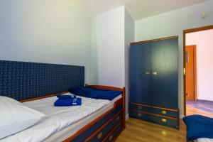Posteľ alebo postele v izbe v ubytovaní Apartament Barbara