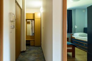 Posteľ alebo postele v izbe v ubytovaní Apartament Barbara