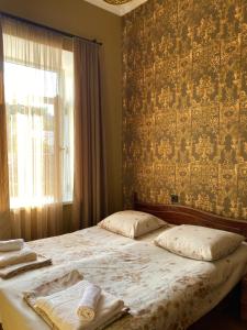 Voodi või voodid majutusasutuse Old House toas