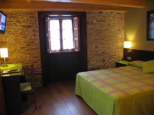 Postel nebo postele na pokoji v ubytování Hotel Rolle