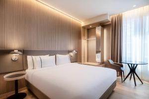 Postel nebo postele na pokoji v ubytování AC Hotel by Marriott Clodio Roma