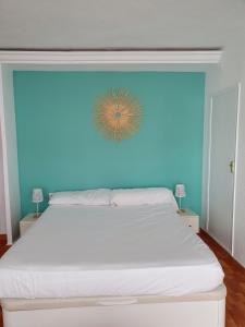 En eller flere senge i et værelse på Estudio con acceso privado a la playa.