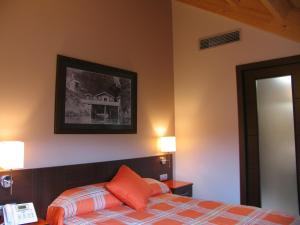 Postel nebo postele na pokoji v ubytování Hotel Rolle