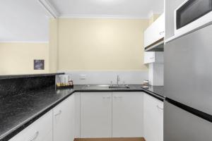 Kuchyň nebo kuchyňský kout v ubytování Convenient self catering unit