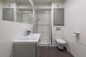 a bathroom with a shower and a sink and a toilet at Górzysty I in Karpacz +26 photos