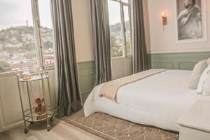 Letto o letti in una camera di Illa Experience Hotel