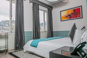Letto o letti in una camera di Illa Experience Hotel