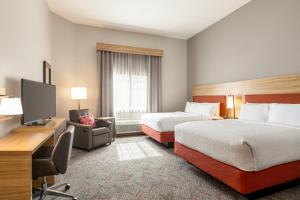 Postel nebo postele na pokoji v ubytování Candlewood Suites Mount Pleasant by IHG + 73 fotografií