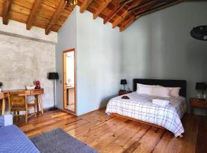 Postel nebo postele na pokoji v ubytování Hotel Jardines Del Carmen