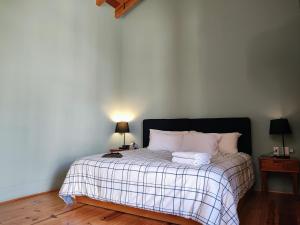 Postel nebo postele na pokoji v ubytování Hotel Jardines Del Carmen