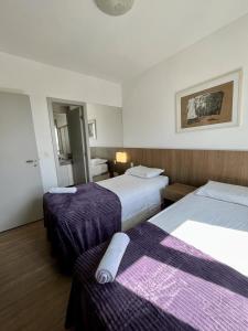 Cama ou camas em um quarto em LK Barro Preto 6