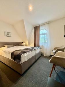 Postel nebo postele na pokoji v ubytování Rozmaryn Rooms & Apartments
