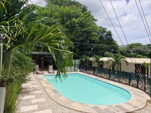 Bazén v ubytování Hotel Carlota Tamarindo nebo v jeho okolí