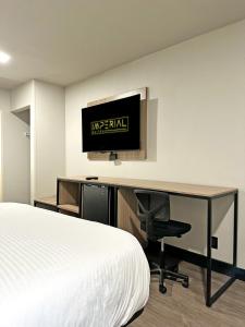 Imperial Suites, Adults Only客房内的一张或多张床位