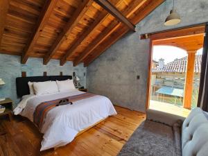 Postel nebo postele na pokoji v ubytování Hotel Jardines Del Carmen
