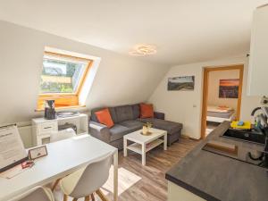 Posezení v ubytování B6 - Urlaubsmagie - Inmitten der Sächsischen Schweiz mit Balkon mit Ausblick auf die Sandsteine