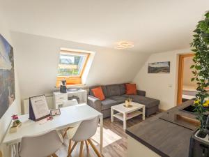 Posezení v ubytování B6 - Urlaubsmagie - Inmitten der Sächsischen Schweiz mit Balkon mit Ausblick auf die Sandsteine