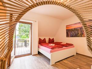 Postel nebo postele na pokoji v ubytování B6 - Urlaubsmagie - Inmitten der Sächsischen Schweiz mit Balkon mit Ausblick auf die Sandsteine