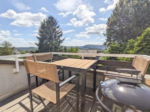 Balkón nebo terasa v ubytování B6 - Urlaubsmagie - Inmitten der Sächsischen Schweiz mit Balkon mit Ausblick auf die Sandsteine