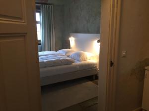 Ένα ή περισσότερα κρεβάτια σε δωμάτιο στο Hotel David an der Donau