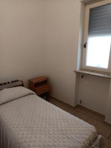 Postel nebo postele na pokoji v ubytování Casa vacanza Il Rifugio