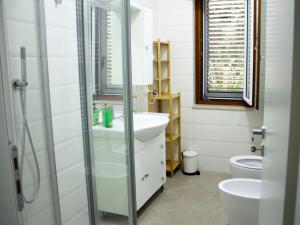 Bilik mandi di Casa Vacanze Villa Matelda +52 gambar