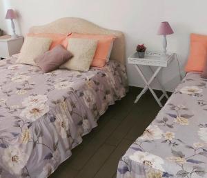Posteľ alebo postele v izbe v ubytovaní B&B La Perla Bianca