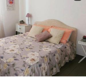 Posteľ alebo postele v izbe v ubytovaní B&B La Perla Bianca