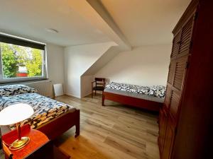 Postel nebo postele na pokoji v ubytování Bee Flats