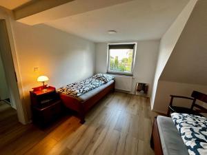 Postel nebo postele na pokoji v ubytování Bee Flats