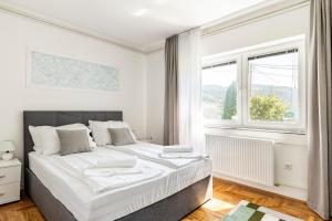 Postel nebo postele na pokoji v ubytování Villa Green Paradise