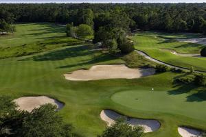 an overhead view of a golf course with multiple greens at 2nd Floor: Awesome Views of the 10th Fairway in Pawleys Island