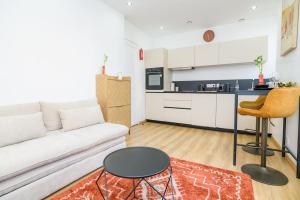 Η κουζίνα ή μικρή κουζίνα στο Appartement Cosy Juvisy +9 φωτογραφίες