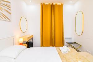 Ένα ή περισσότερα κρεβάτια σε δωμάτιο στο Appartement Cosy Juvisy