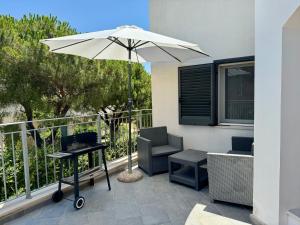 Balkón alebo terasa v ubytovaní Villa Fiorella Porto Cesareo primo piano 2 locali