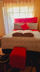 Uma cama ou camas num quarto em Goodlife guest house in klerksdorp