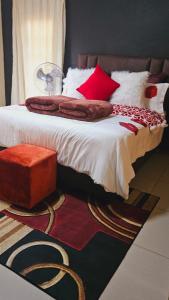 Uma cama ou camas num quarto em Goodlife guest house in klerksdorp