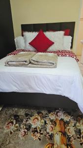 Uma cama ou camas num quarto em Goodlife guest house in klerksdorp