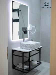 Koupelna v ubytování Da Zara Hotel + 37 fotografií