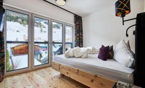 A bed or beds in a room at Hotel Venetblick