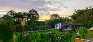 a garden with a playground and a house at GatoPardo in Montenegro