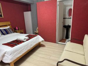 Rúm í herbergi á Hotel Plateros