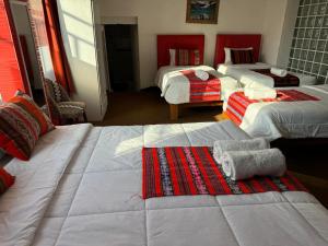 Rúm í herbergi á Hotel Plateros