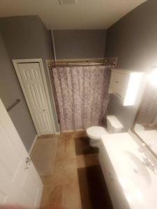 Koupelna v ubytování Tranquil Oasis Resort + 7 fotografií