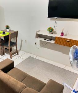 TV a/nebo společenská místnost v ubytování Apartamento completo e central! Casa Rute!